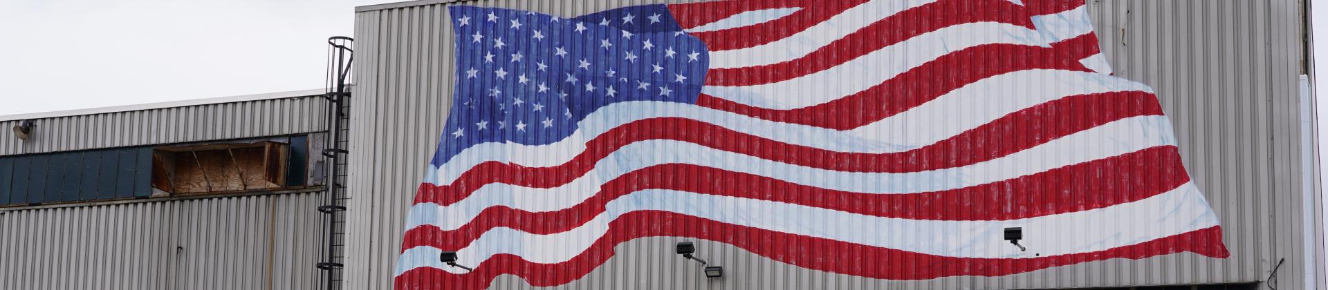 US flag mural over building